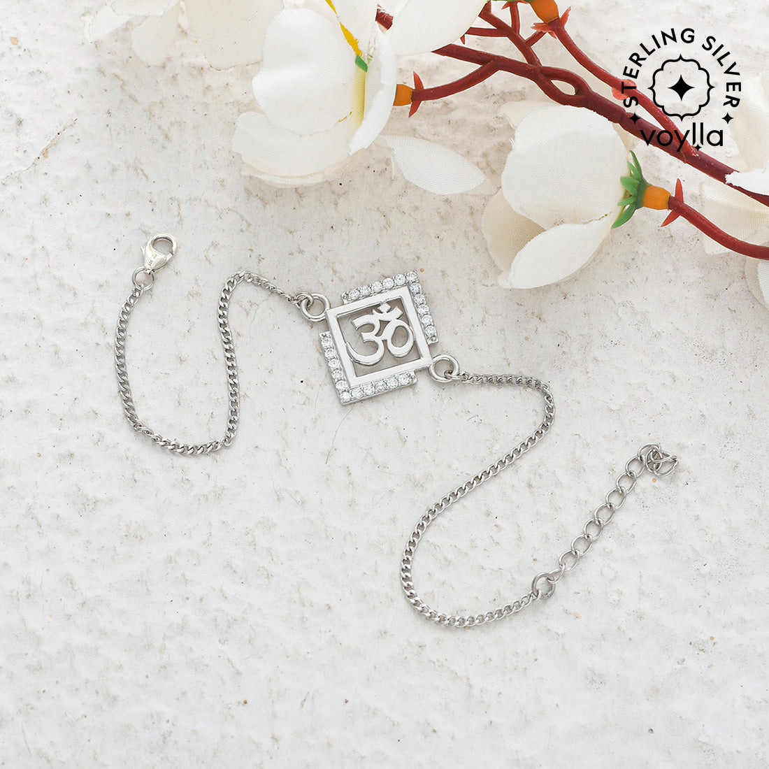 Sterling silver Om Rakhi with intricate detailing, blending spiritual symbolism with a timeless, elegant design for brothers.