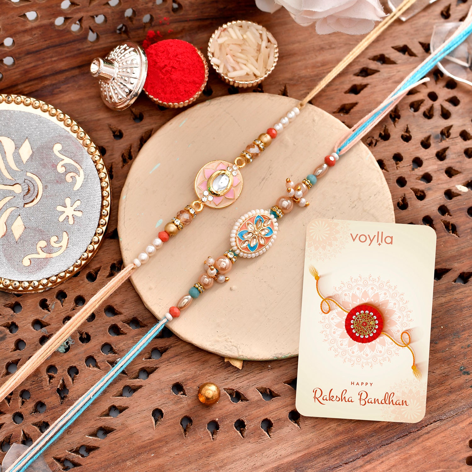 Kundan rakhi styled with traditional outfit