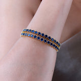 Sparkling Elegance Round Blue CZ Yellow Gold-Plated Bangles