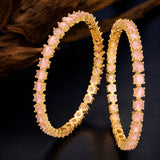 Sparkling Elegance Round Pink CZ Yellow Gold-Plated Bangles
