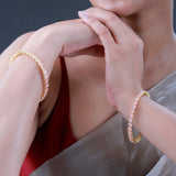 Sparkling Elegance Round Pink CZ Yellow Gold-Plated Bangles