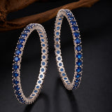Sparkling Elegance Round Blue CZ White Rhodium-Plated Bangles