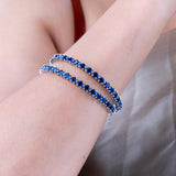 Sparkling Elegance Round Blue CZ White Rhodium-Plated Bangles