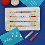 Set of 4  Pearl Beads Embellished Flamboyant Rakhi | Voylla Rakhi