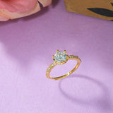 Six Prong High Set Zircon Adorned Brass Gold Plated Ring