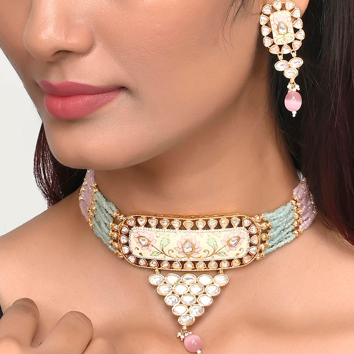 Floral Motifs Faux Kundan and Pink Pearls Brass Gold Plated Jewellery Set