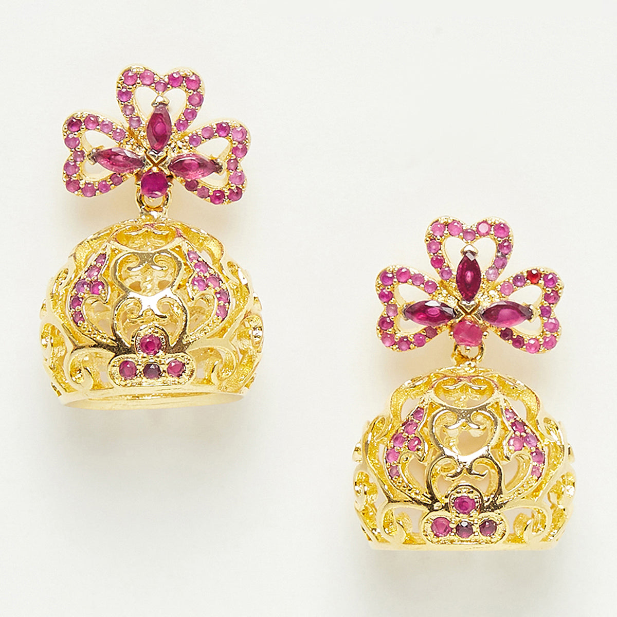 Gold Plated Chic Jhumki Earrings Ornamented With Pink Color Stones