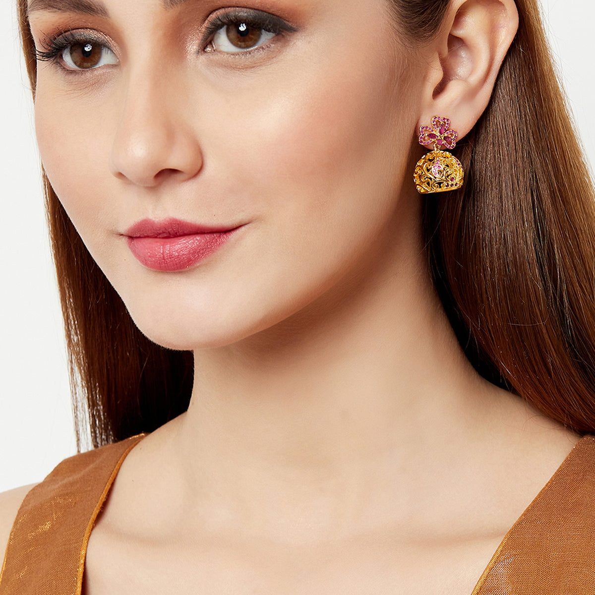 Gold Plated Chic Jhumki Earrings Ornamented With Pink Color Stones