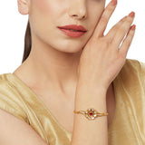 Floral Teardrop Cut Kundan Embellished Brass Gold Plated Bracelet