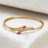 Gold Finish Bracelet with Pink Zircons