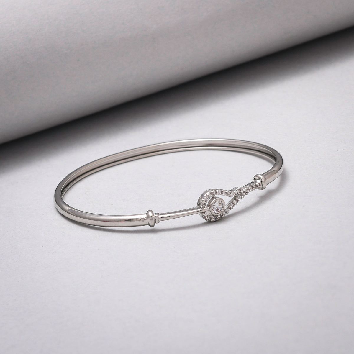 Sparkling Elegance Cluster Setting Round Cut Zircons Adorned Brass Rhodium Plated Bracelet