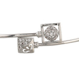 Sparkling Elegance Edgy Zircons Adorned Brass Rhodium Plated Overlap Bracelet
