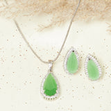 Sparkling Elegance Silver Pendant Set with Green Stones