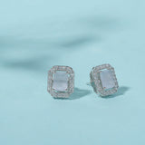 Sparkling Elegance Cluster Setting Emerald Cut Zircons Brass Silver Plated Earrings