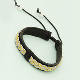 black pu leather bracelet with twisted white-yellow thread designing
