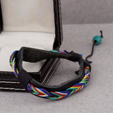 black pu leather band bracelet with twisted multicoloured thread designing