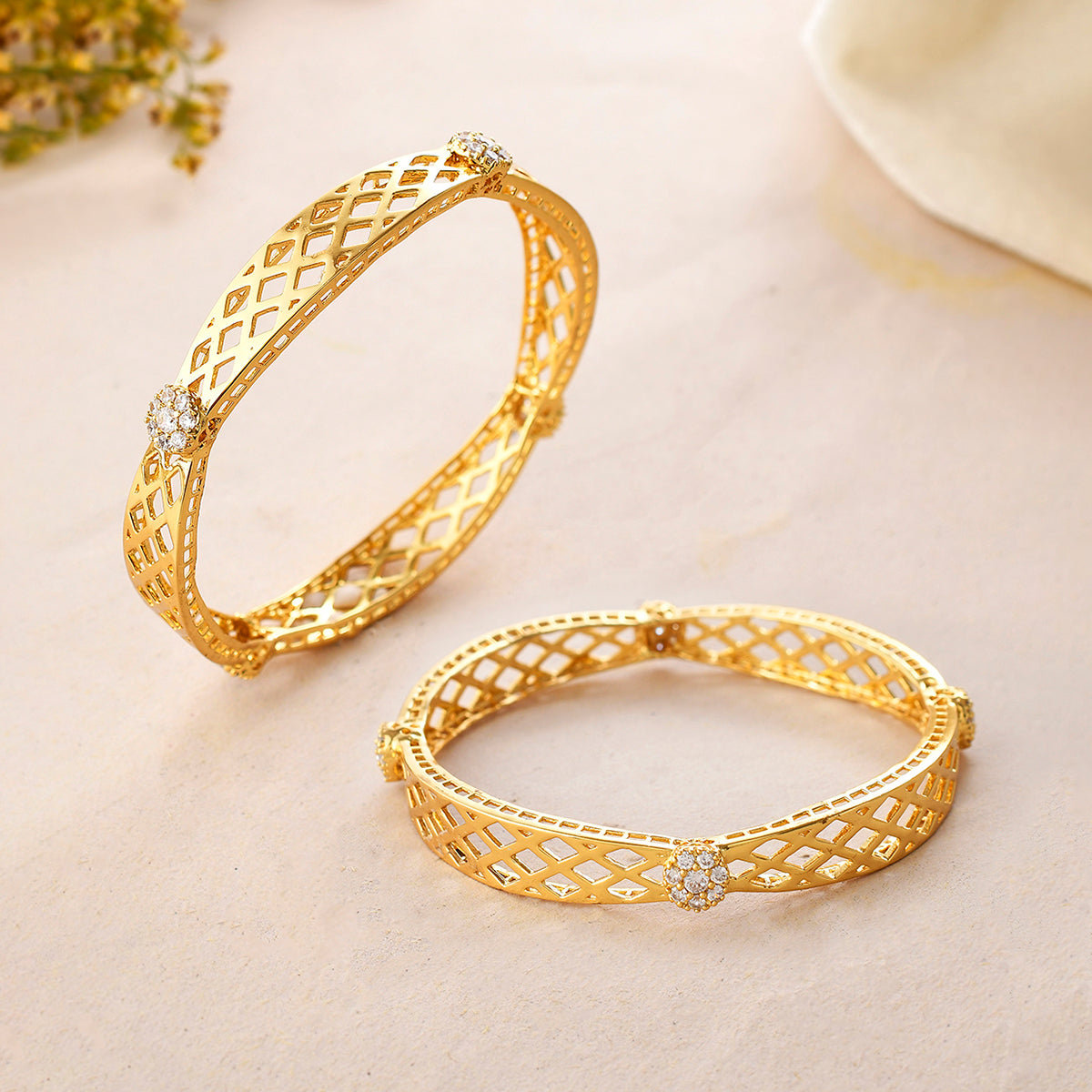 Sparkling Elegance Diamond Shaped Cutwork Gold Plated Bangles – VOYLLA