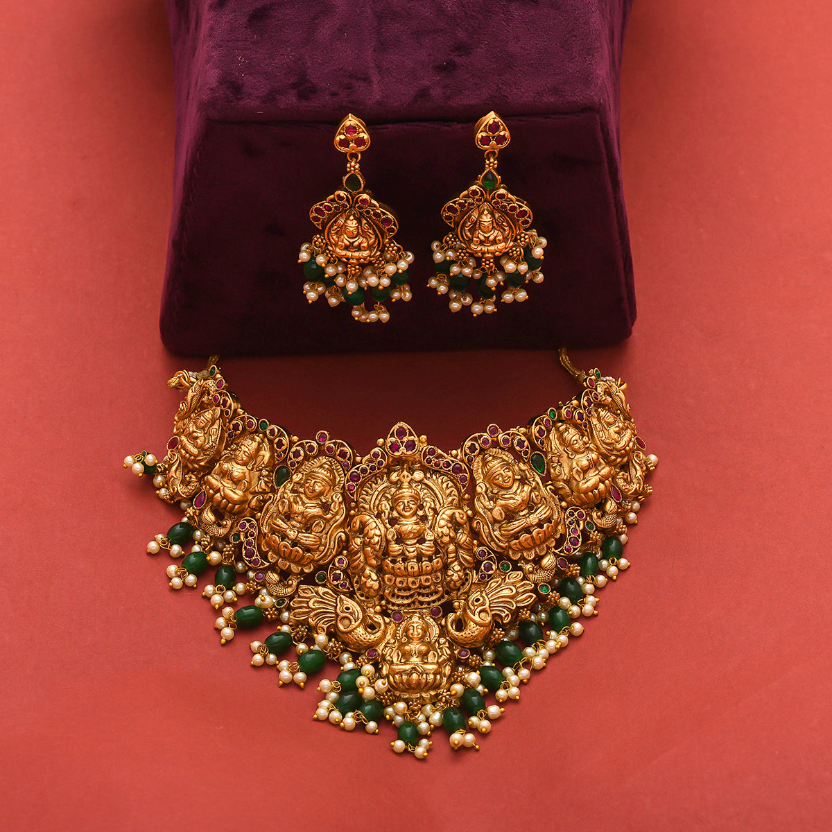 Divine Motifs Temple Design Brass Gold Toned Jewellery Set