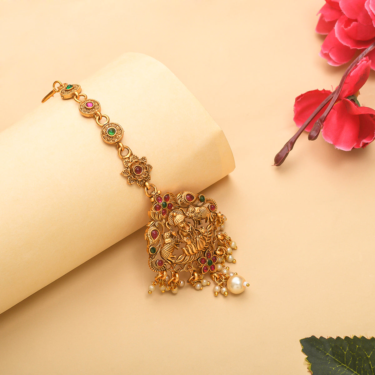 Opulent Temple Design Brass Faux Pearls and CZ Adorned Gold Plated Maang Tika