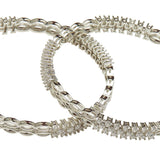 Round Cut CZ Adorned Silver Plated Cutwork Pattern Brass Slip-on Bracelet