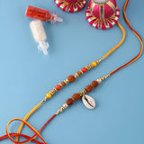 Set Of Two Spirtiual Rakhi With Roli Chaawal Pack