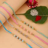 Set Of 4 Multi Colored Beaded Rakhi With Roli Chaawal Pack