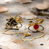 Red stone decked dual ring in unique geometric motif