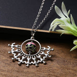 Adorned Spin Circle and Tribal Motifs Pendant