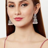 Shwet Kamal Faux Pearls Adorned Peacock Motif Silver Plated Jhumka Earrings